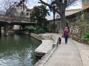 Gina walking along a San-Antonio canal